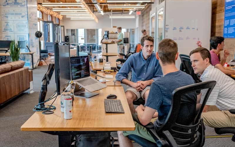 Agency team collaborating on strategy and AI implementation